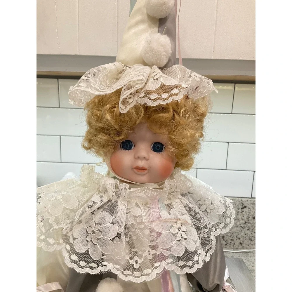 VINTAGE PORCELAIN DOLL IN CLOWN COSTUME